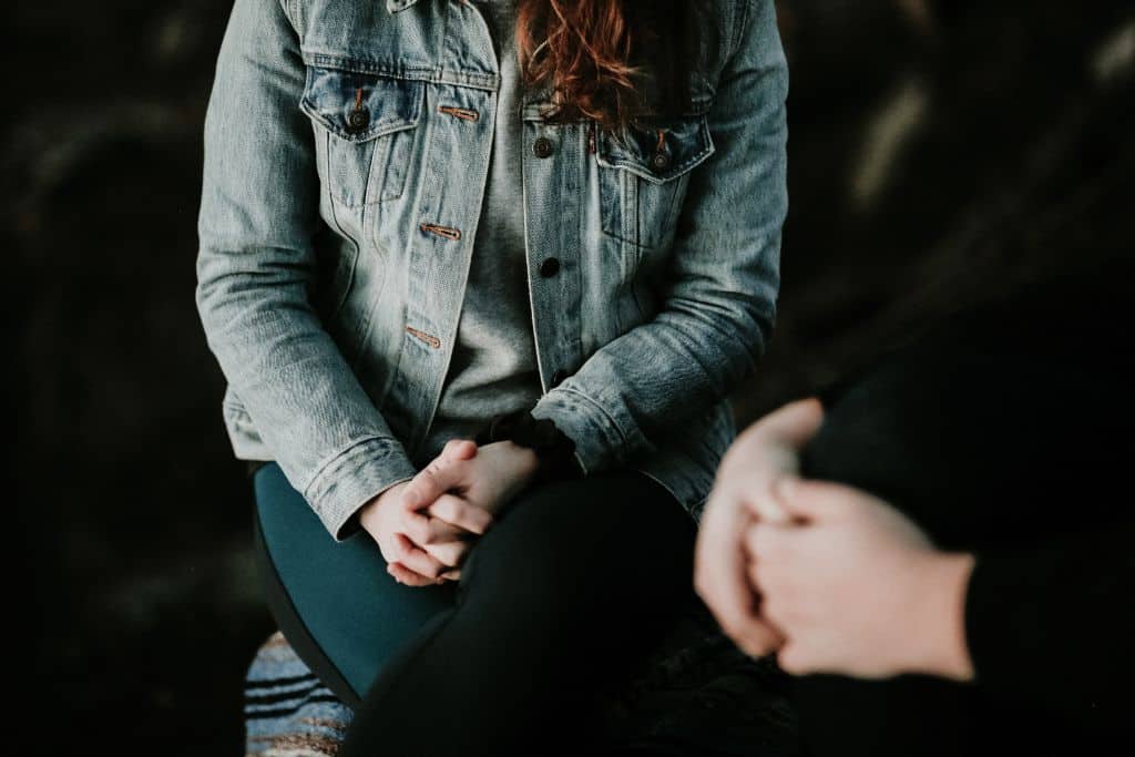 A shot of a woman in a 1-2-1 therapy session - Which Rehab