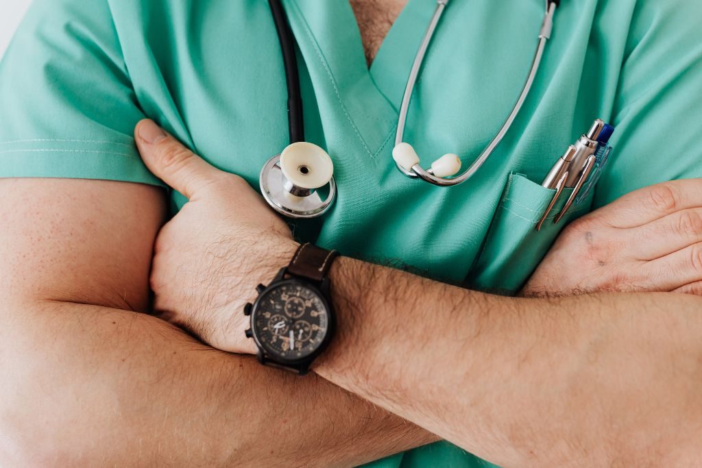 Doctor crossing arms - Which Rehab